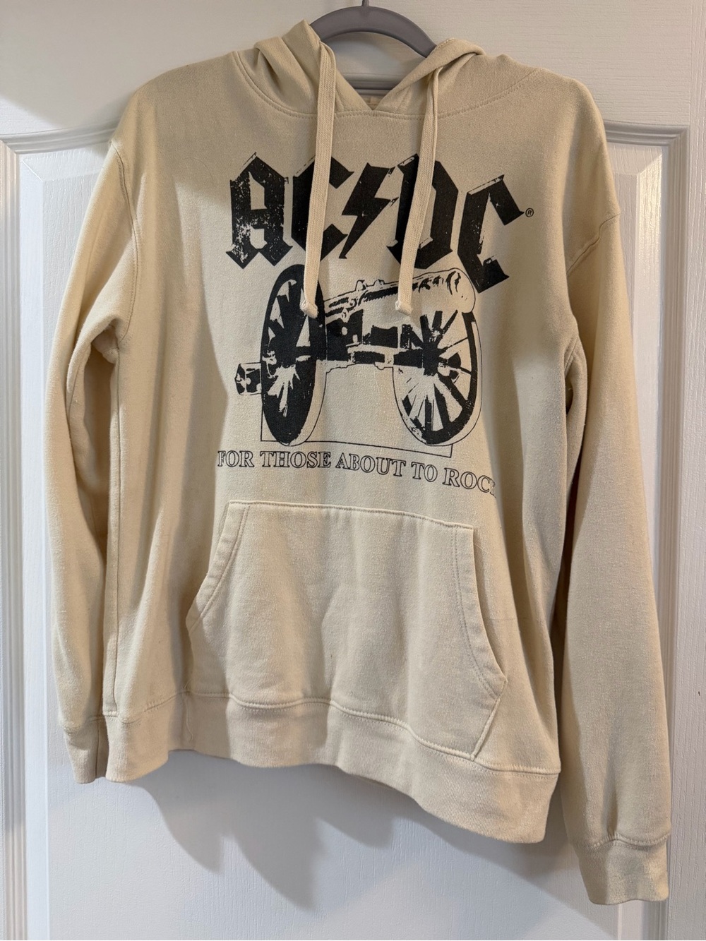 AC/DC Cream Hoodie with Black Cannon Graphic